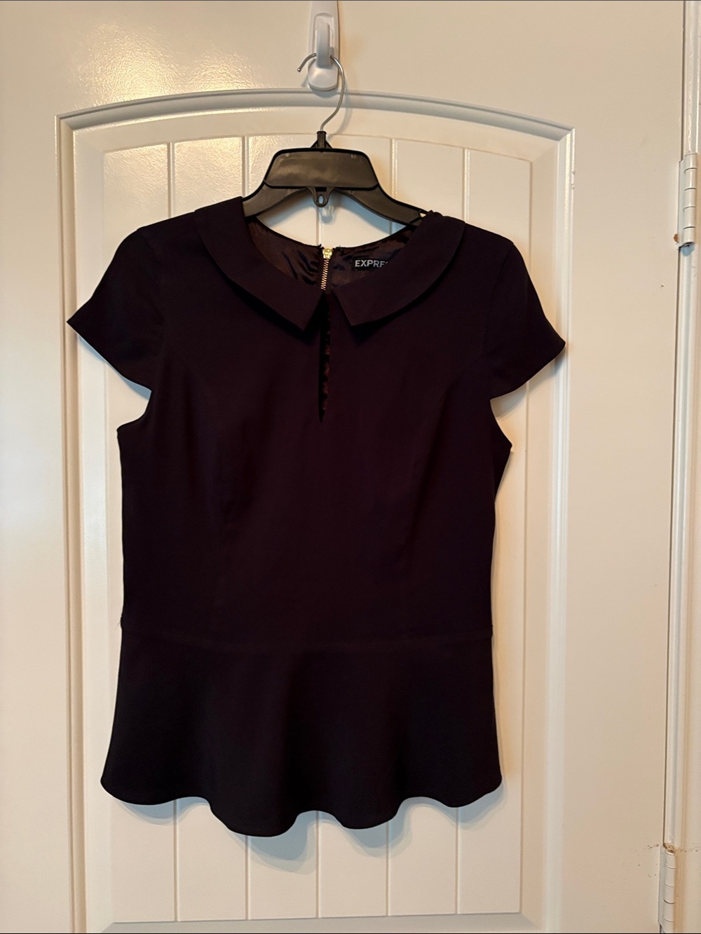 Express peplum top with cap sleeves size M